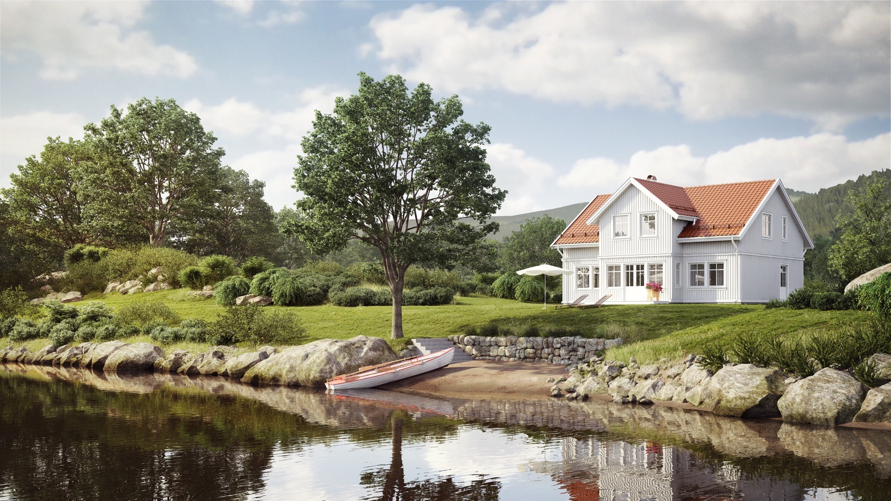 et hvitt hus ved bredden av en innsjø.