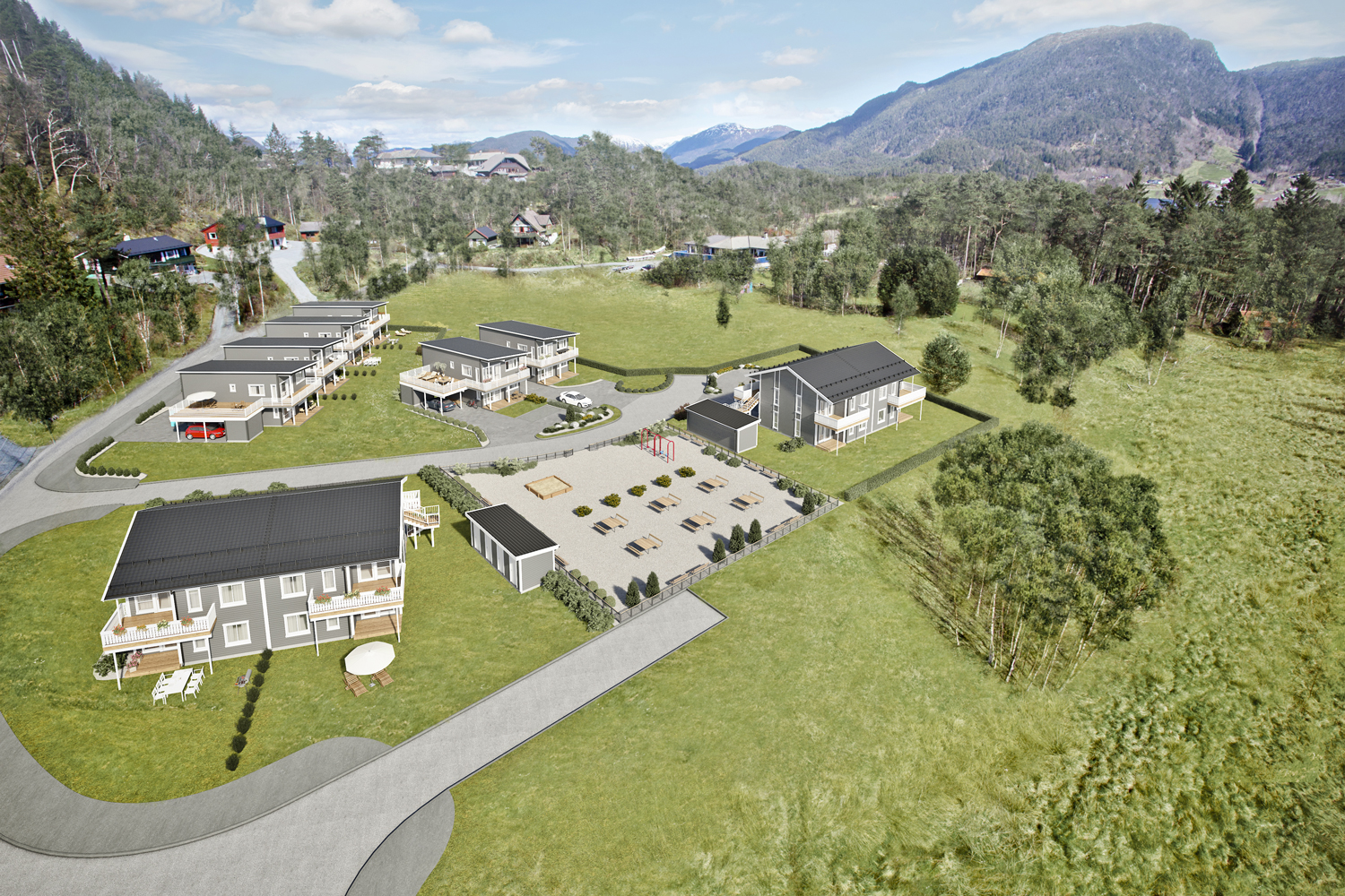en luftfoto av et boligområde i fjellet.