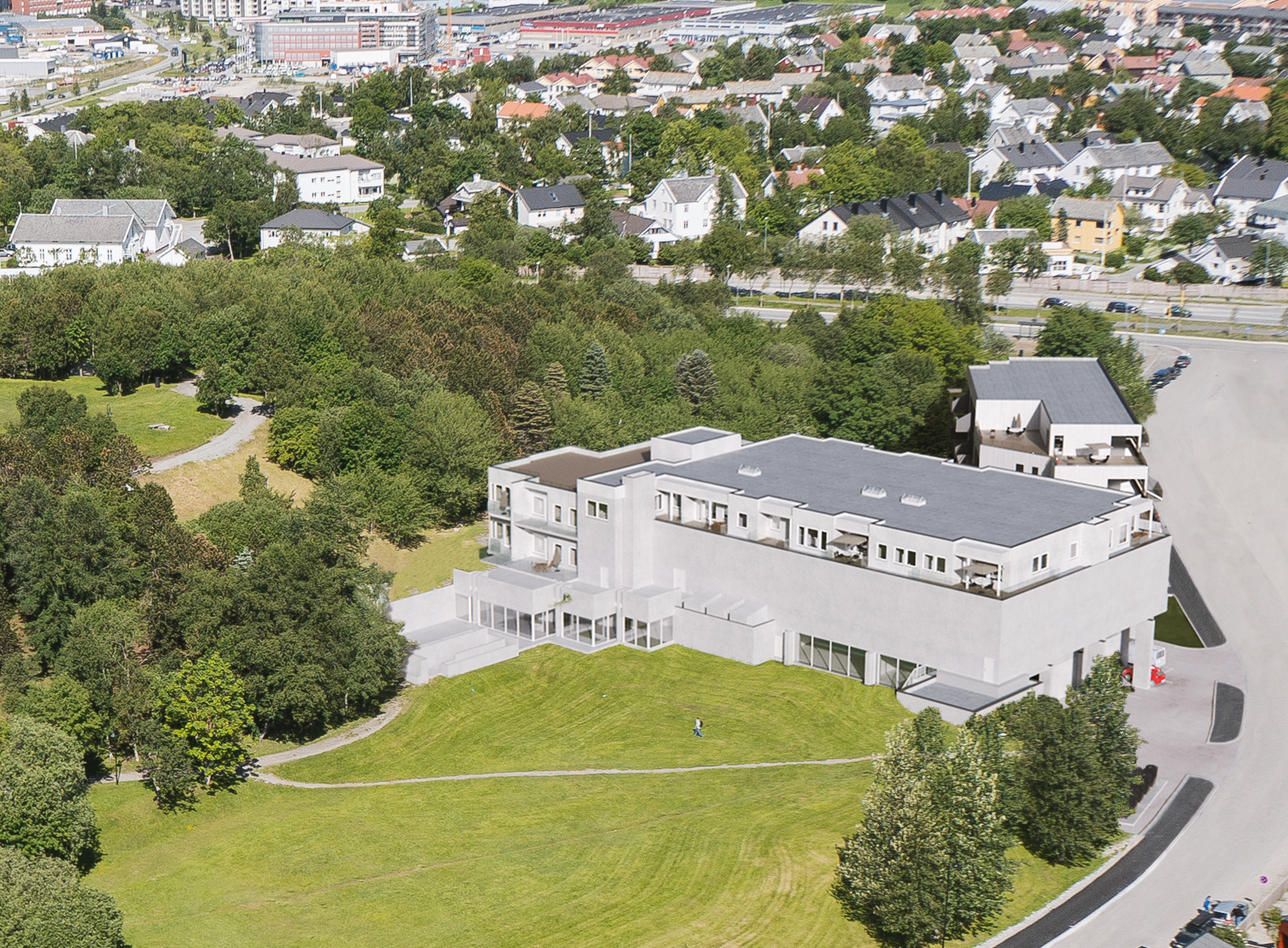 Luftfoto av en bygning i en gressmark for salg visualisering, 2016.