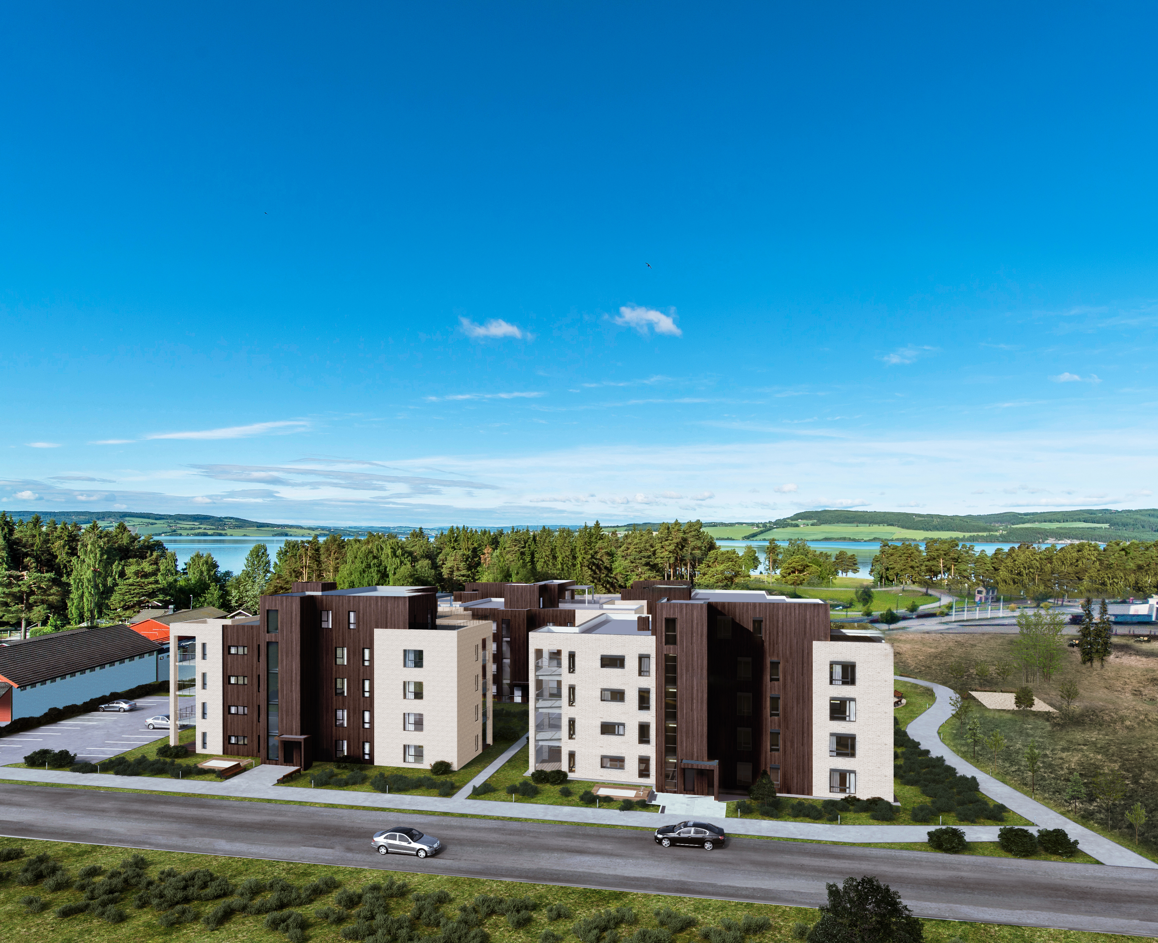 en kunstners gjengivelse av et leilighetskompleks med en innsjø i bakgrunnen.