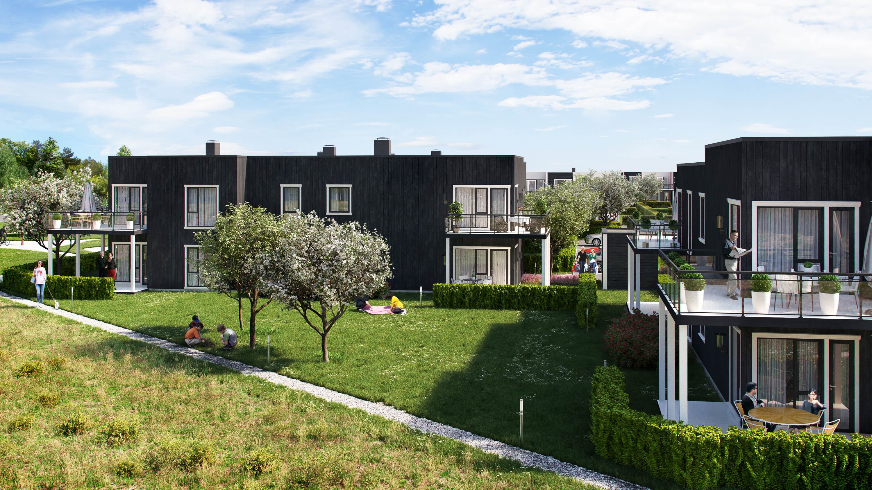et gressområde foran leilighetsbyggene som ble brukt til å visualisere salg i 2016 for klient Opthimal.