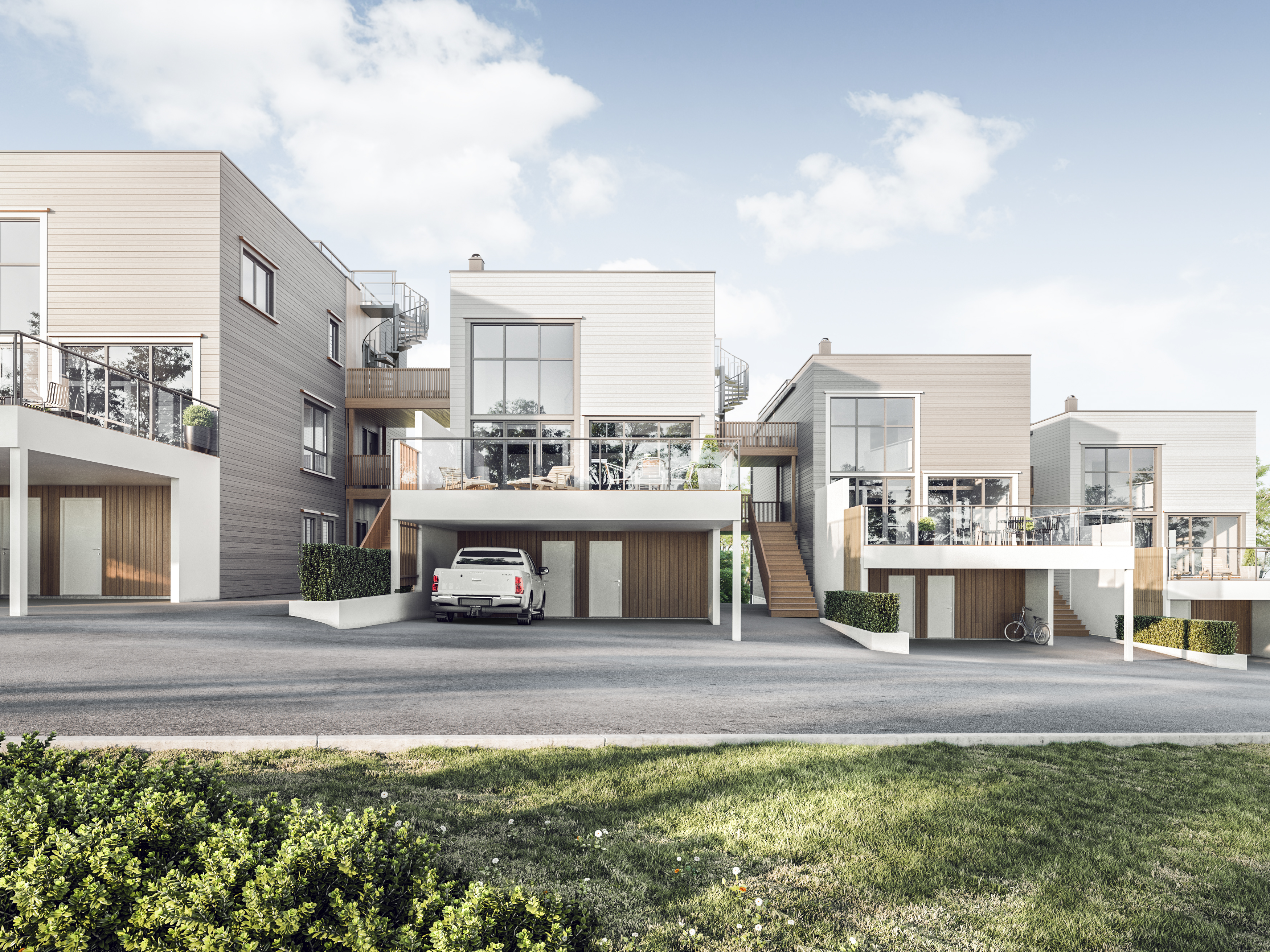 en gjengivelse av en moderne bygård med en bil parkert foran.