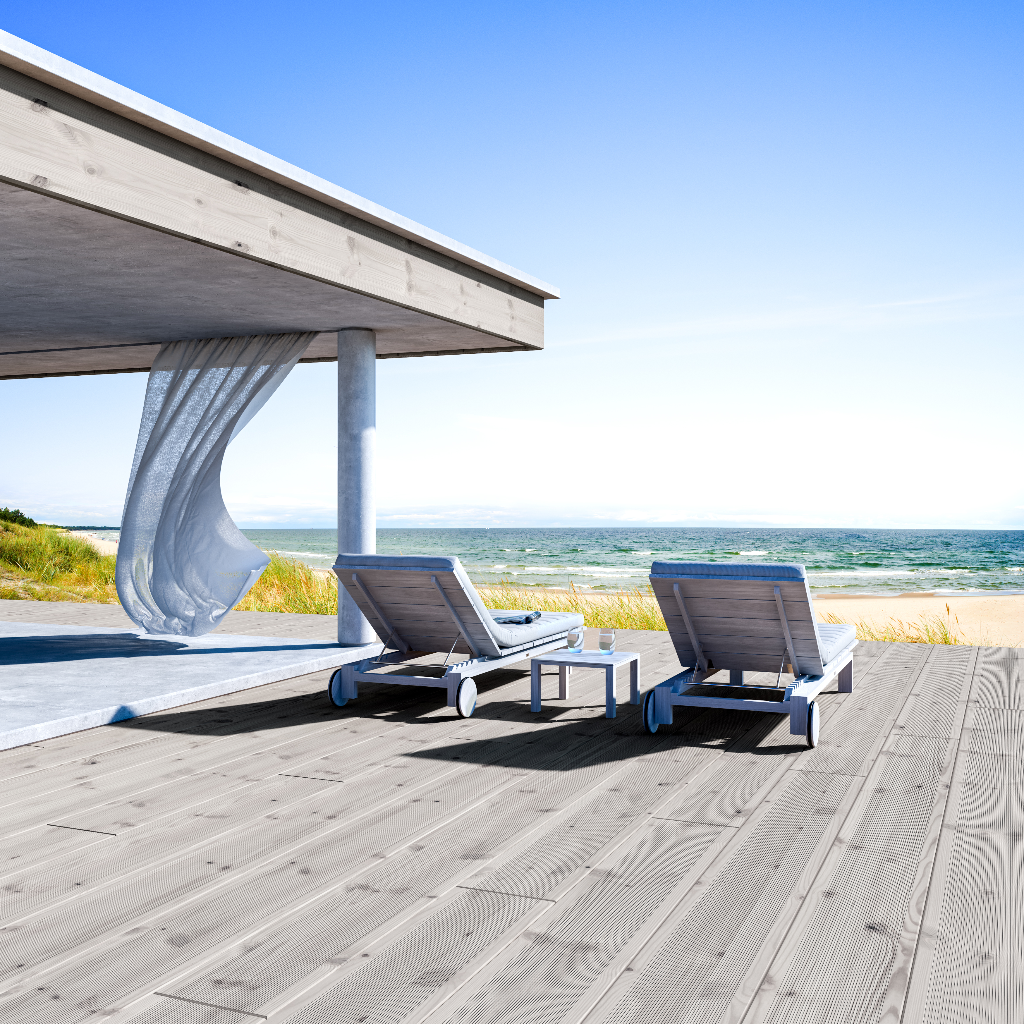 et treterrasse på stranden.