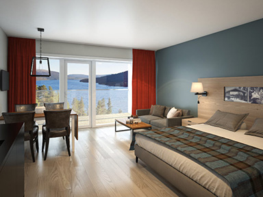 en seng i et rom med utsikt over en innsjø.
