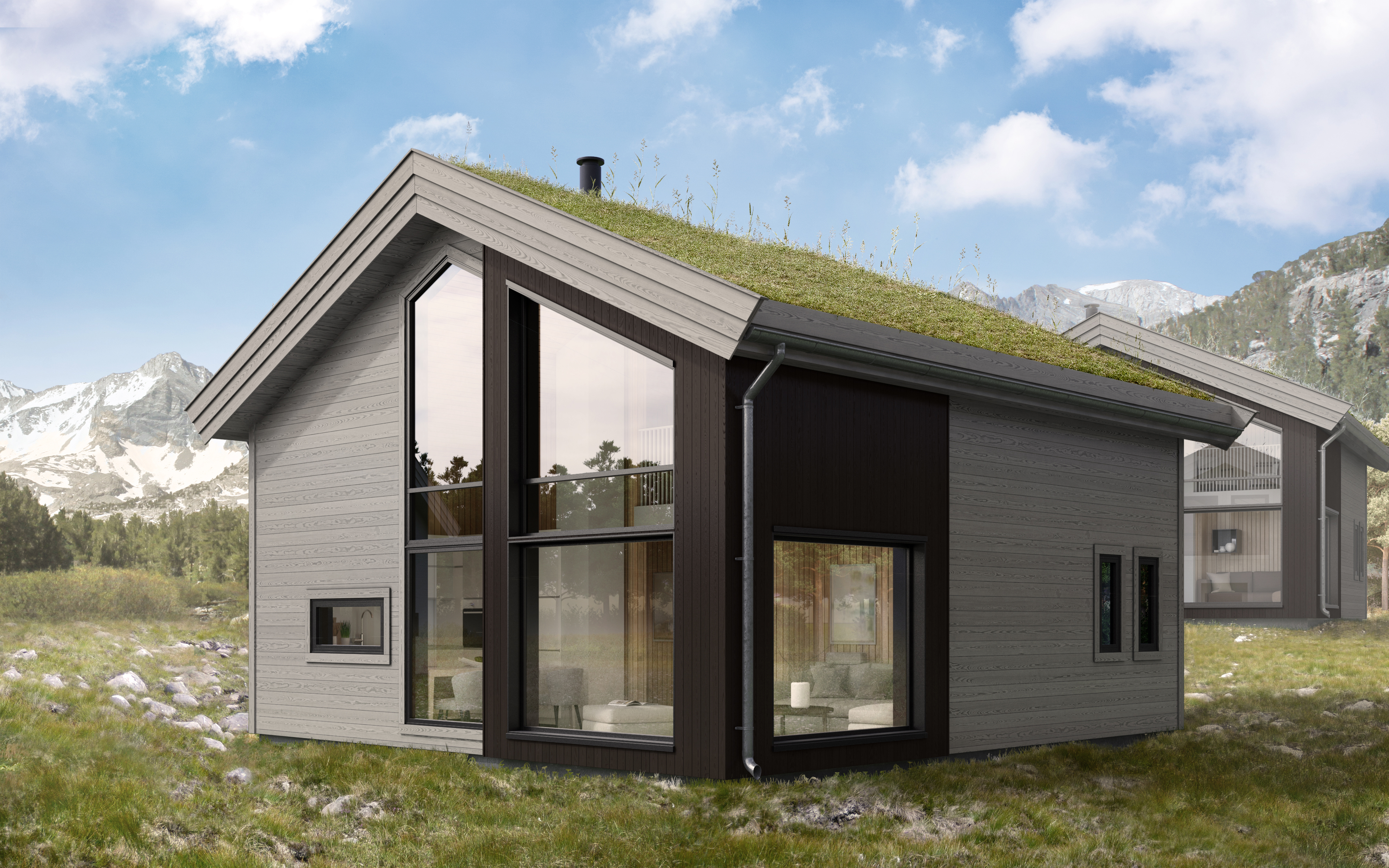 et lite hus med grønt tak i fjellet.