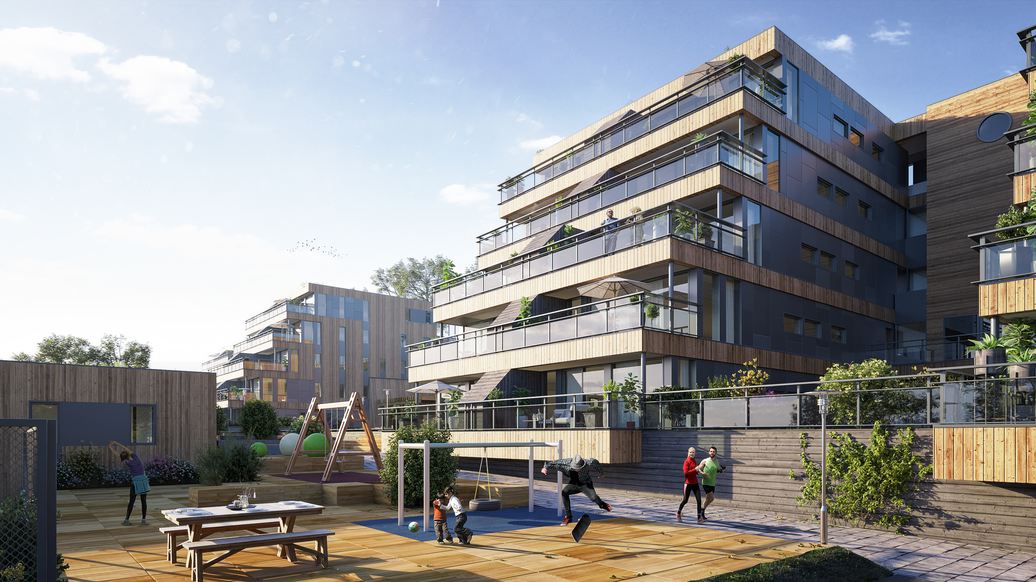 en gjengivelse av en bygård med lekeplass.