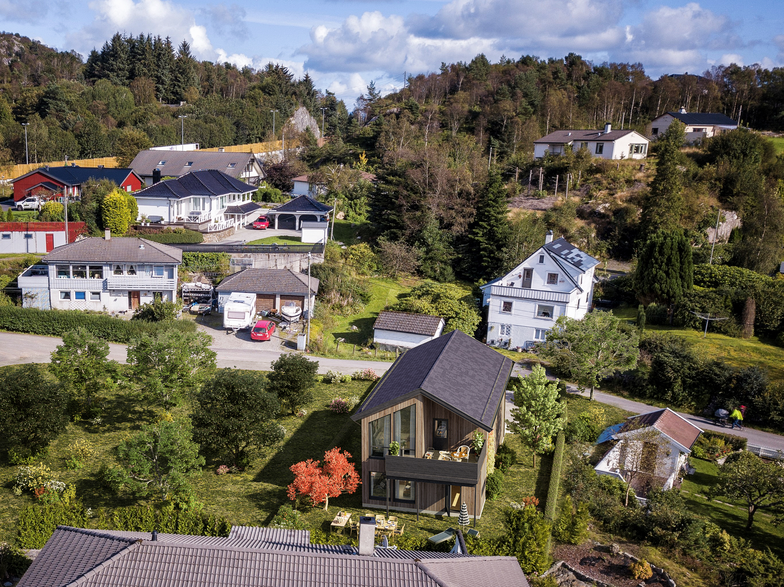 et luftfoto av hus i en landsby.
