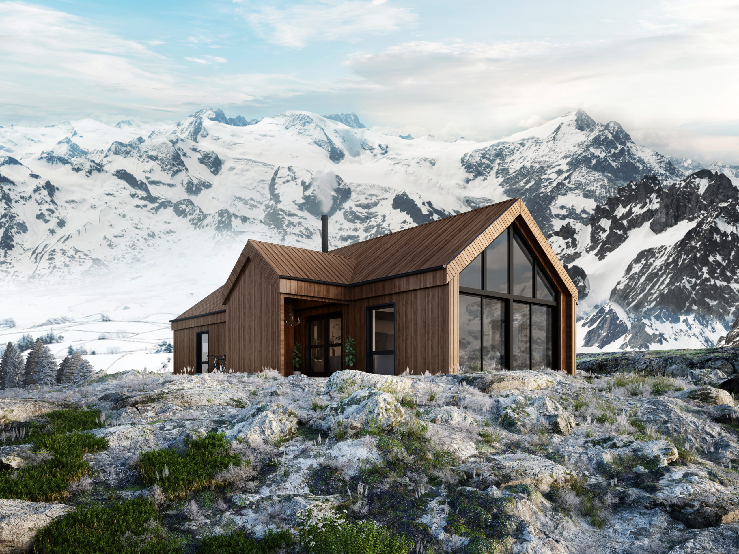 en hytte på toppen av et fjell med fjell i bakgrunnen.