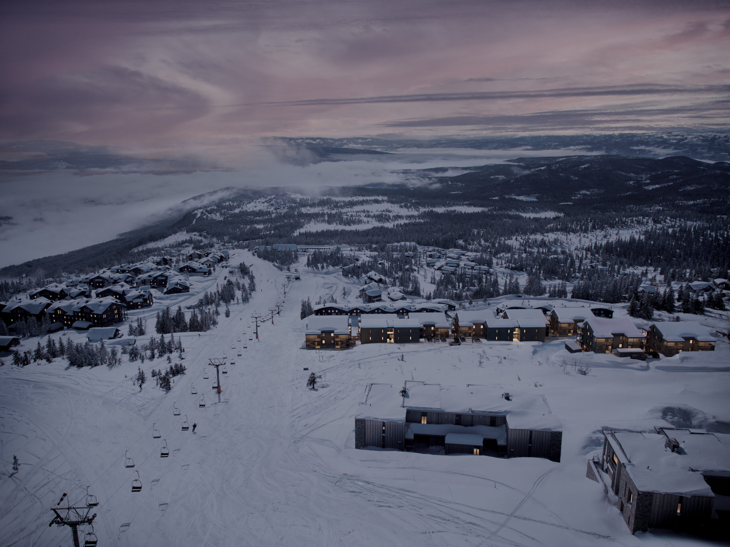 en luftfoto av et skianlegg i skumringen.