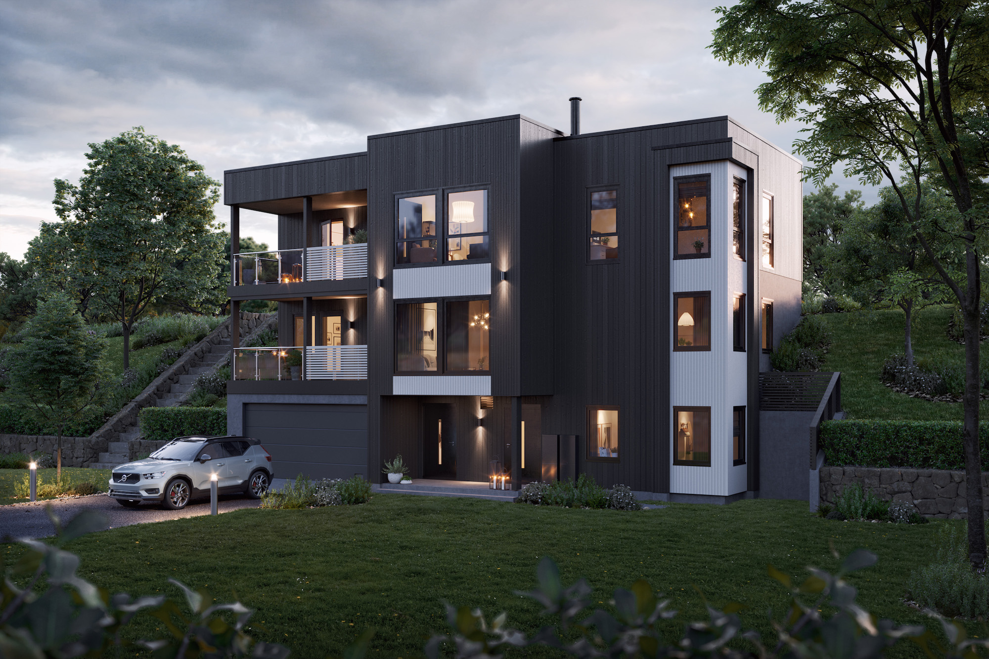 et moderne hus med en bil parkert foran.