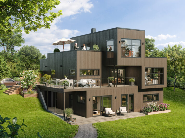 et moderne hus på en grønn plen.